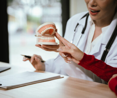 "Certified Denturist consulting with a patient at the Belleville Denture Clinic