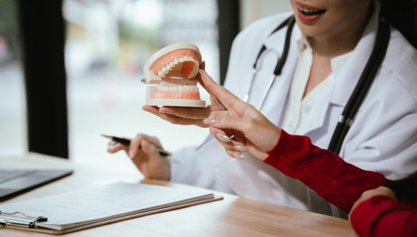 "Certified Denturist consulting with a patient at the Belleville Denture Clinic