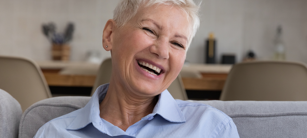 old woman wearing premium dentures